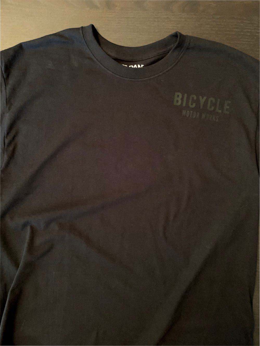 A black shirt with the words bicycle made easy on it.