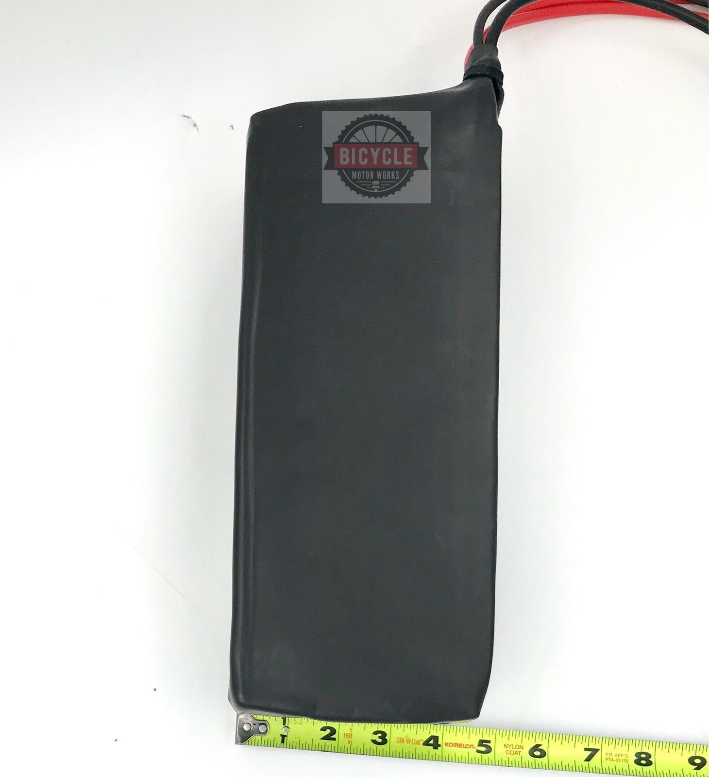 A black bag with a ruler and a meter