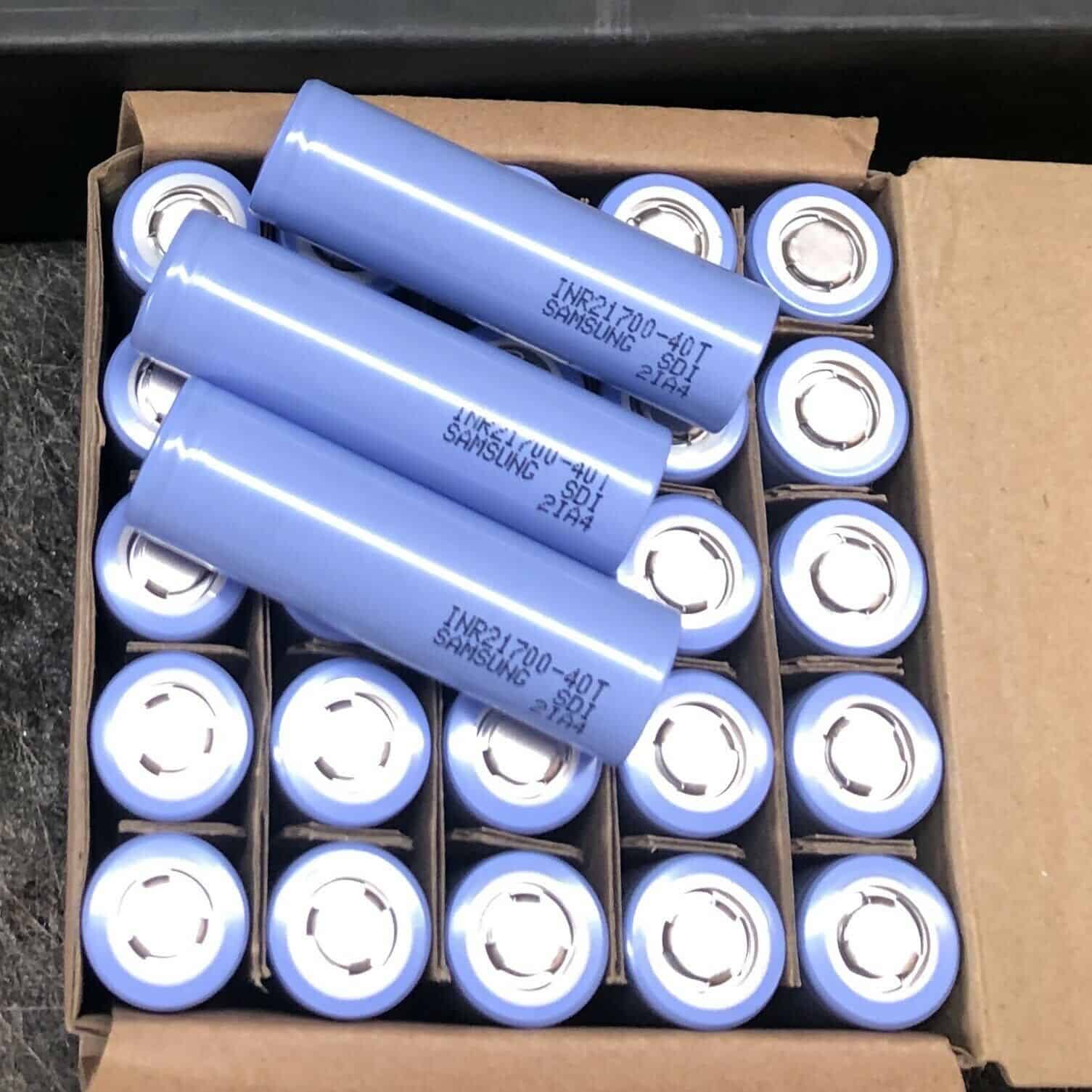 A box of batteries are sitting in the open.