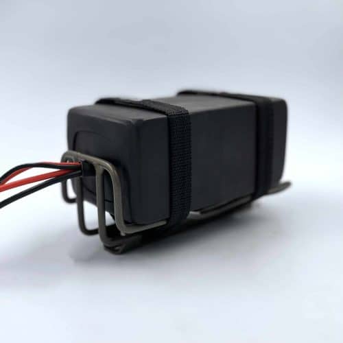 A black box with wires attached to it