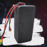 A black battery with wires attached to it.