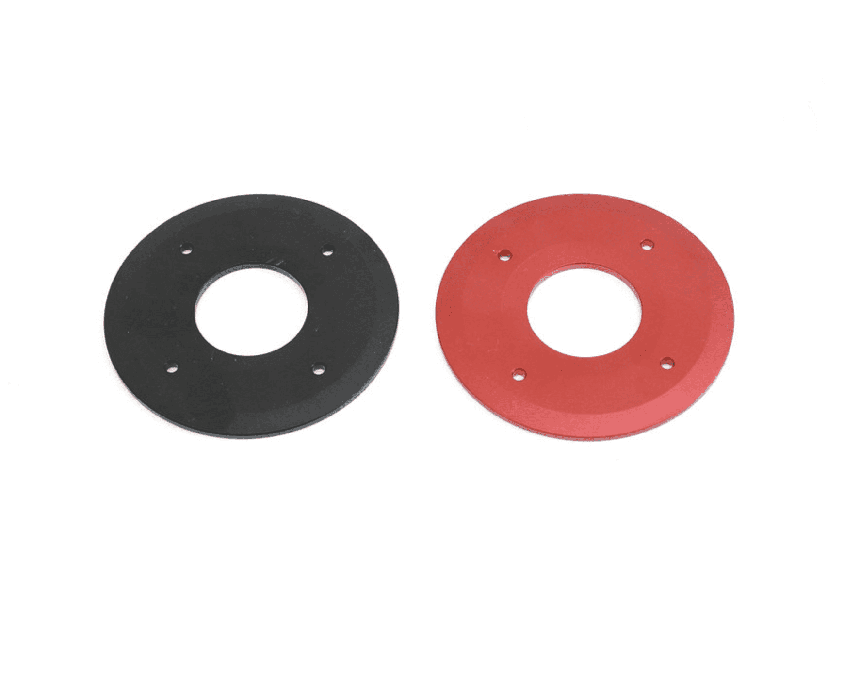 A pair of black and red rubber washers.