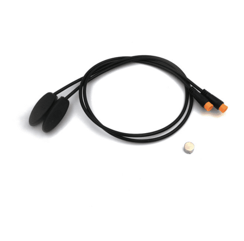 A black cord with an orange end and a white button